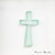 Close view of light blue cross figurine