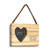A rectangular hanging wood ornament with a heart shaped two inch photo opening next to the saying "Life is Simple. Just Add Water." under two black lines with room for personalization, displayed angled to the right.