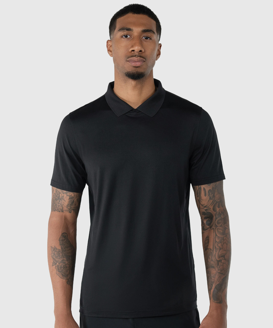 Men’s moisture-wicking Legacy T-Polo in black with flat-knit collar