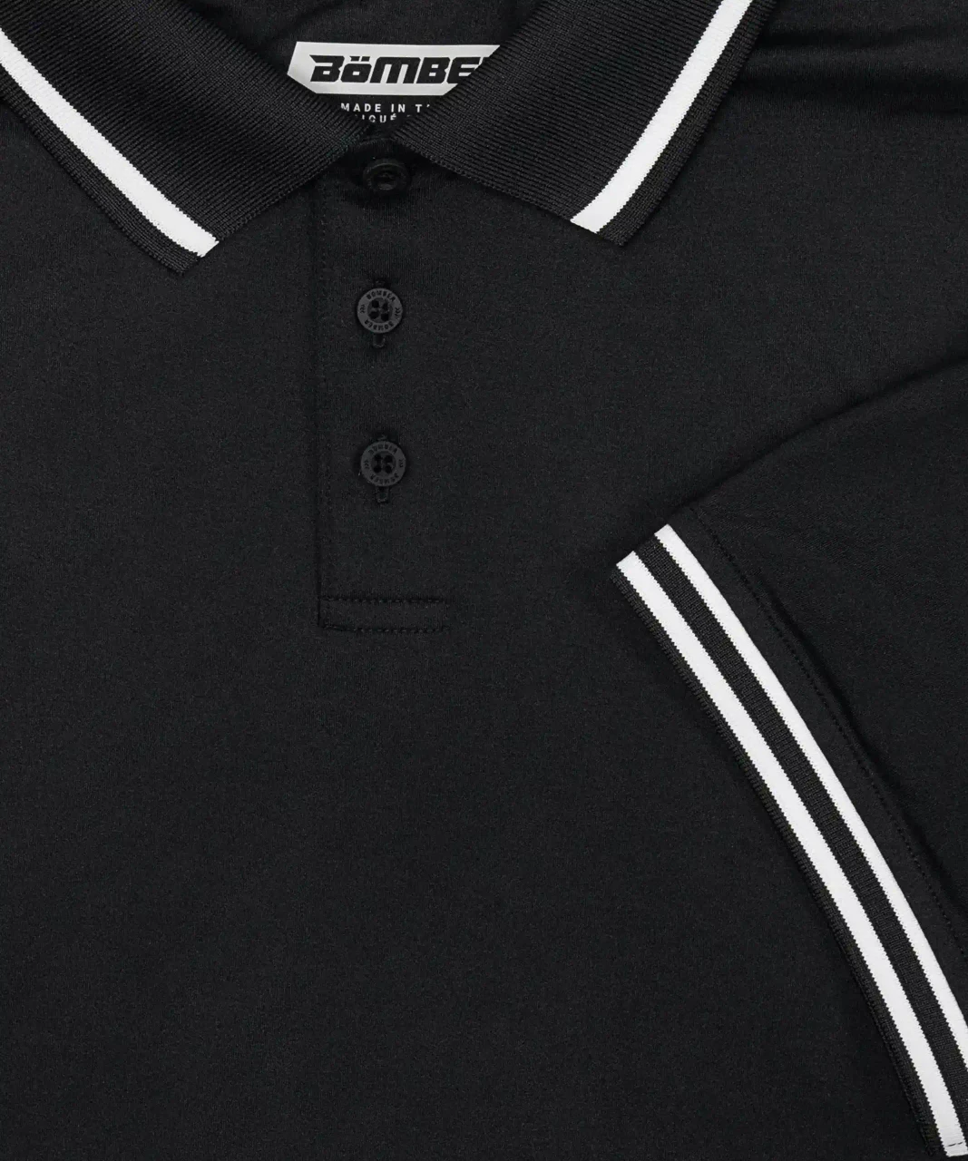 Acropolis Polo black collar and placket detail, close-up view