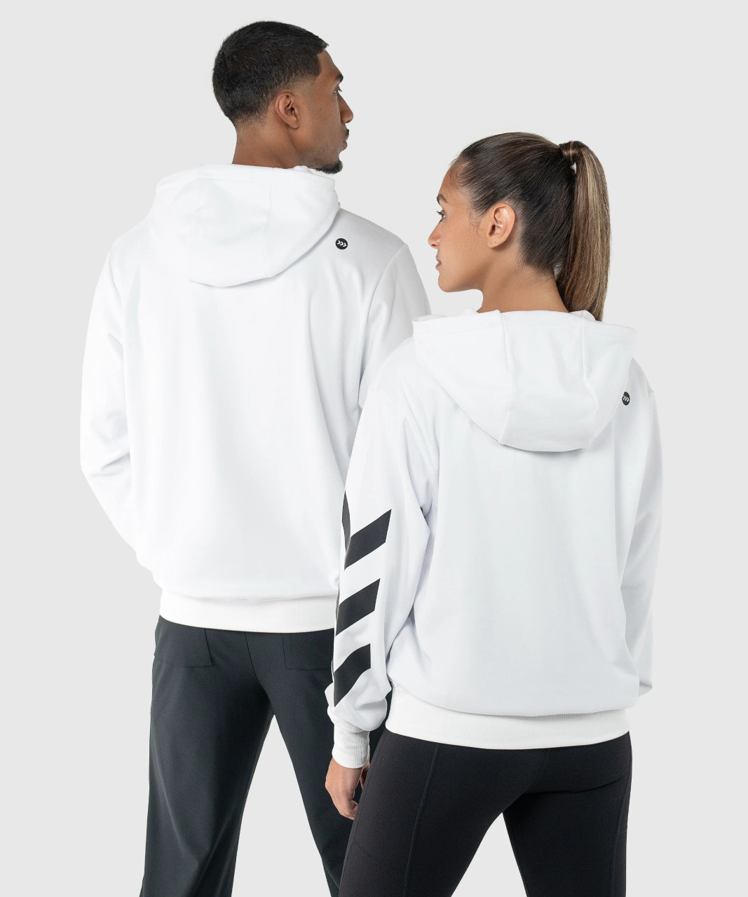 Back view of men’s and women’s white lightweight performance hoodies