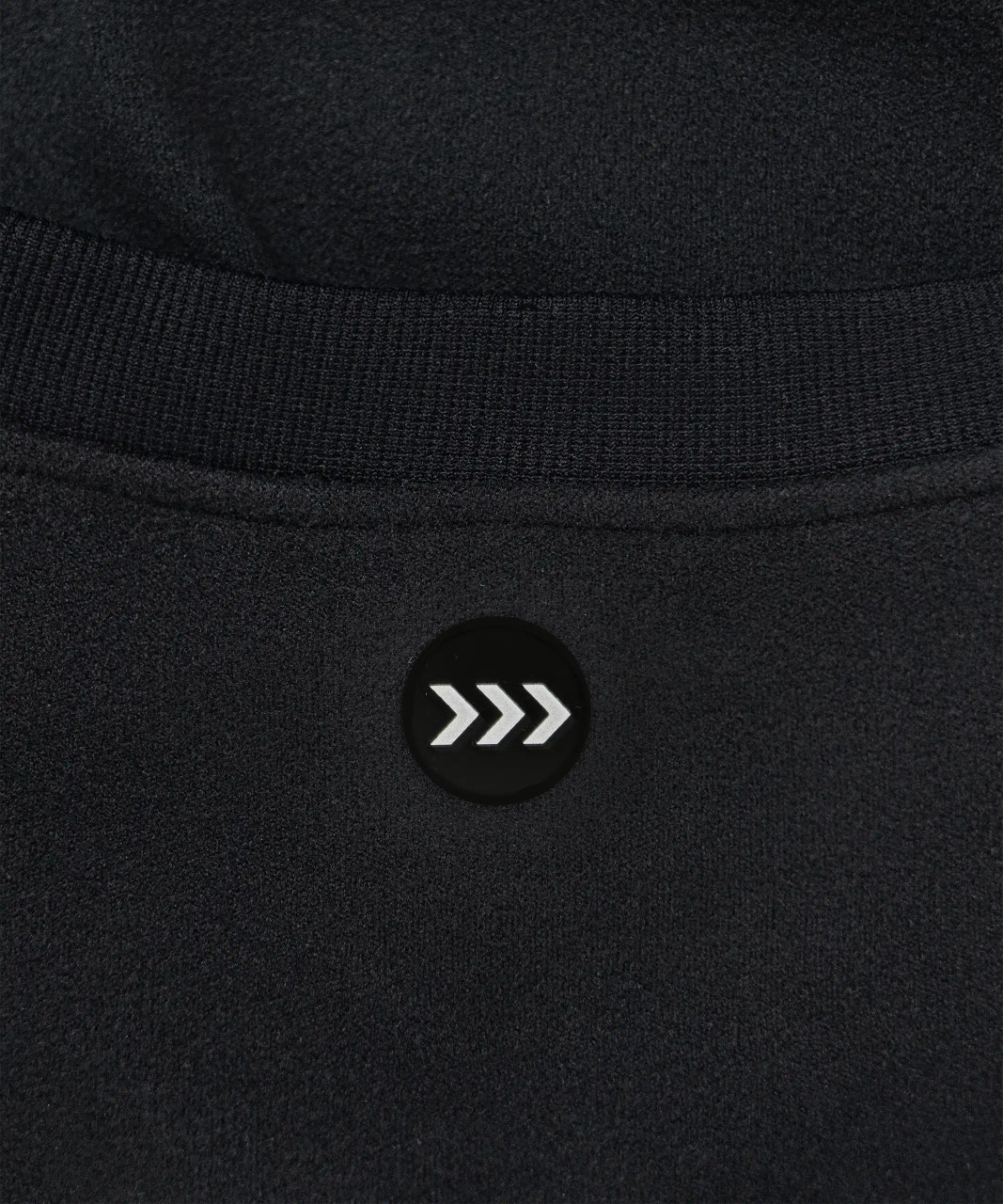 Excel Crewneck Black embossed logo close-up