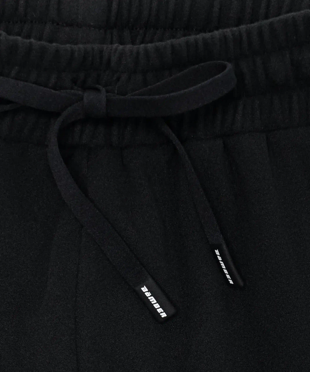 Excel Jogger, women's black performance joggers with adjustable drawcord waistband, close-up view