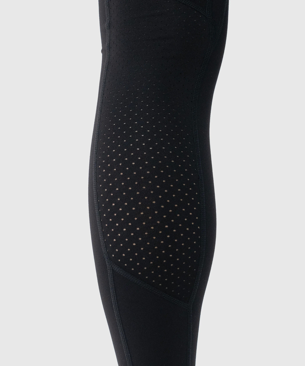 Leggings de sport noirs avec empiècement perforé respirant