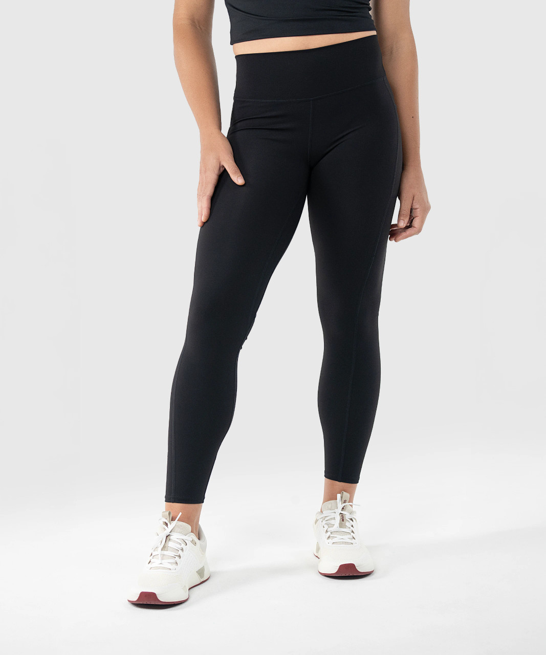 Leggings de sport noirs à taille haute pour femme, coupe athlétique ajustée