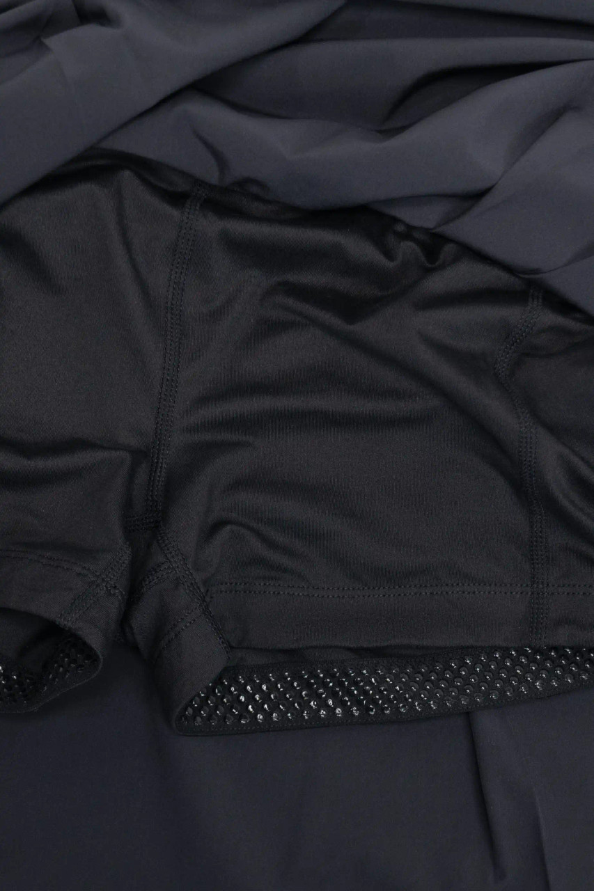Built-in black undershorts with grip lining inside women’s athletic skort