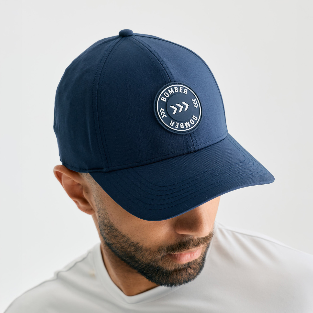 Zone Snapback, men's navy snapback hat, close-up front view
