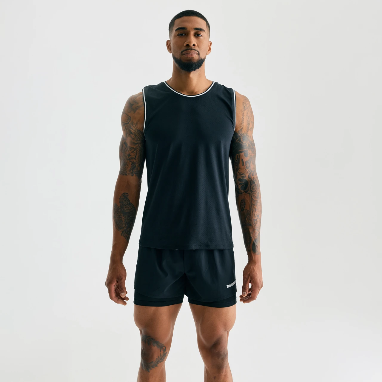Pivot CC Tank, men's black performance tank with athletic fit, front view
