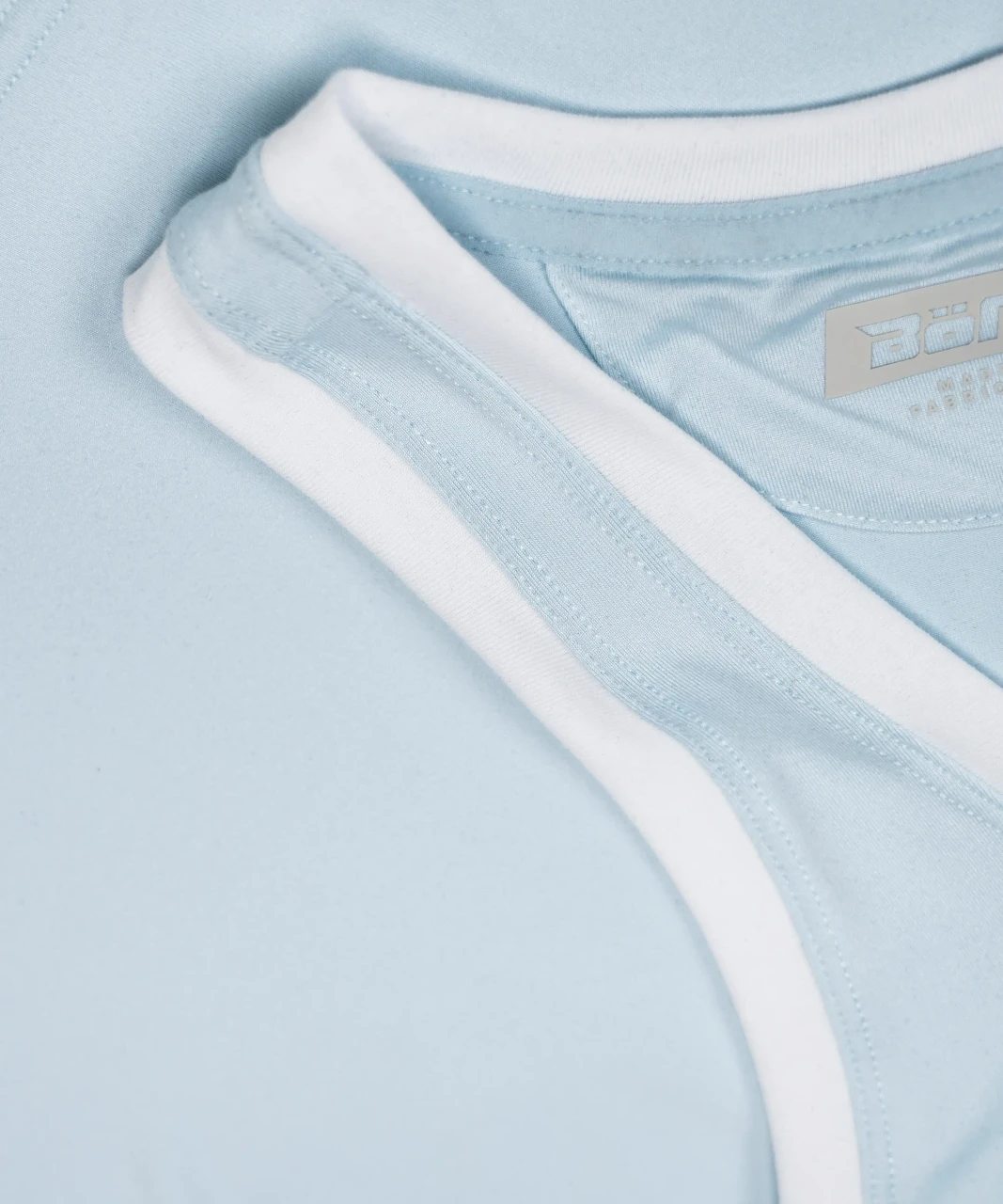 Energize Tank light blue neckline close-up