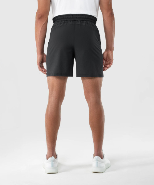 Back view of men’s black 6-inch workout shorts with athletic fit