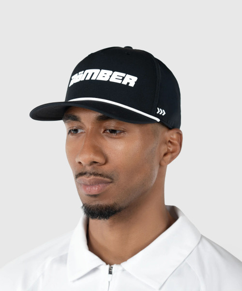 Man wearing black Bomber performance snapback with structured high crown