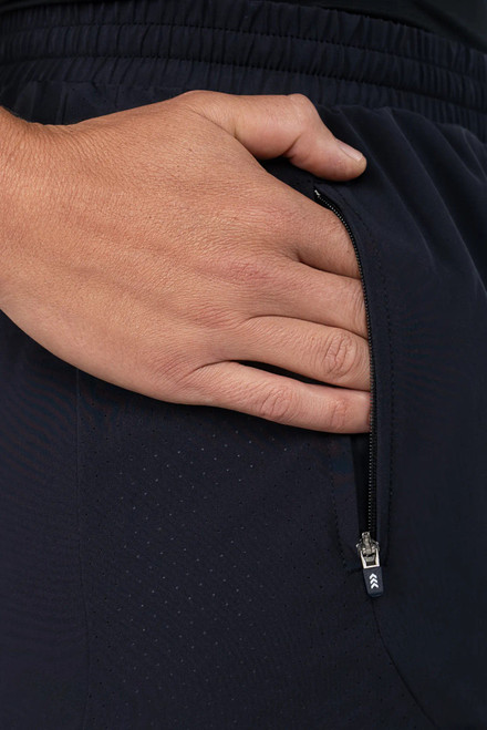 Momentum Active Short, black performance shorts with side pocket, close-up view