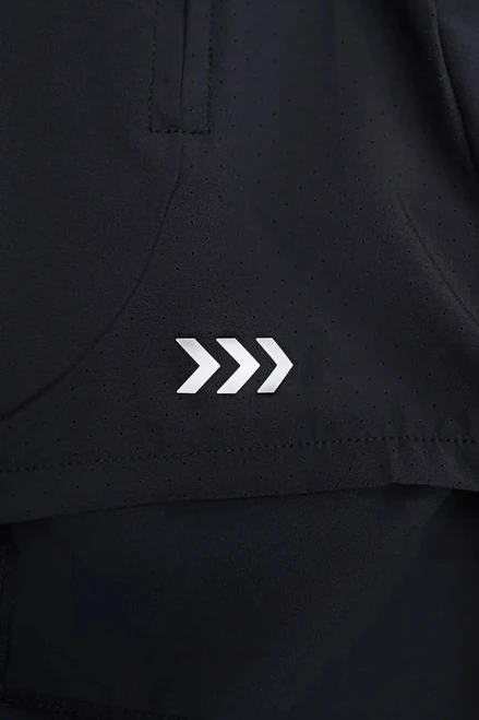 Momentum Active Short, black performance shorts with reflective side graphic, close-up view