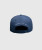 Back view of navy and white performance snapback with adjustable closure