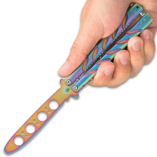 Black Legion Rainbow Titanium Balisong Trainer shown open with hand holding the rainbow titanium handles and blade visible