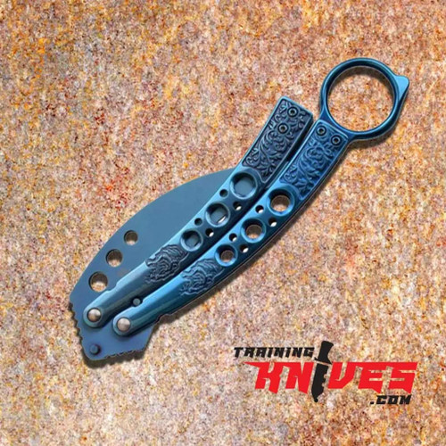 MTechUSA Blue Hawkbill Tribal Etched Butterfly Balisong Trainer shown closed with blue tinite coated stainless steel handles and latch visible