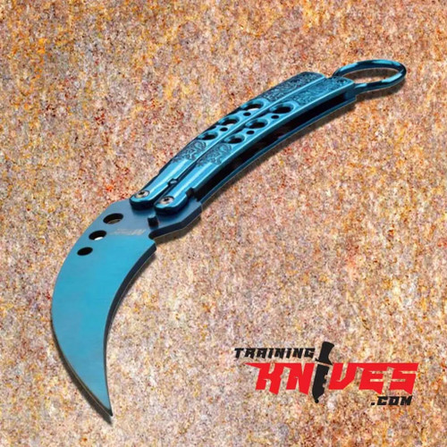 MTechUSA Blue Hawkbill Tribal Etched Butterfly Balisong Trainer shown open laying flat with blue tinite coated hawkbill training blade and stainless steel handles visible