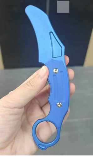 Hoback Knives Tusk Aluminum G10 Karambit Trainer held in hand