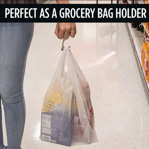Tool being used to carry a grocery bag