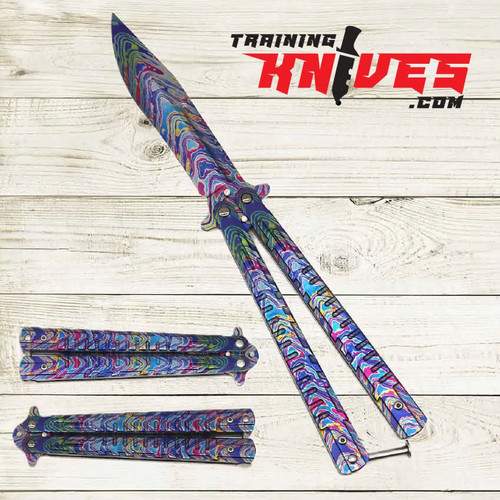 Hero – Colorful Damascus 440 Steel Balisong Butterfly Folding Trainer displayed open and closed side by side, showing both sides of the colorful Damascus-style unsharpened blade and matching patterned handles Hero – Colorful Damascus 440 Steel Balisong Butterfly Folding Trainer displayed open and closed side by side, showing both sides of the colorful Damascus-style unsharpened blade and matching patterned handles