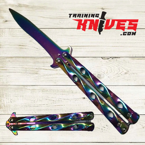 Hero – Rainbow 440 Steel Balisong Butterfly Trainer shown fully open with unsharpened blade and closed side by side, rainbow stainless steel skeletonized handles visible Hero – Rainbow 440 Steel Balisong Butterfly Trainer shown fully open with unsharpened blade and closed side by side, rainbow stainless steel skeletonized handles visible
