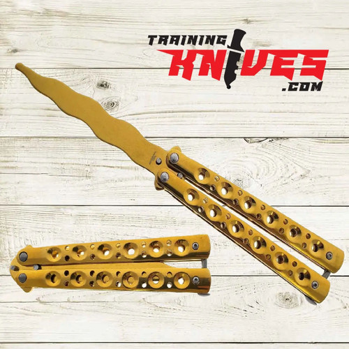 Hero – Gold 440 Steel Kriss Spear Point Balisong Butterfly Trainer shown open with unsharpened blade and closed side by side, gold stainless steel skeletonized handles visible Hero – Gold 440 Steel Kriss Spear Point Balisong Butterfly Trainer shown open with unsharpened blade and closed side by side, gold stainless steel skeletonized handles visible