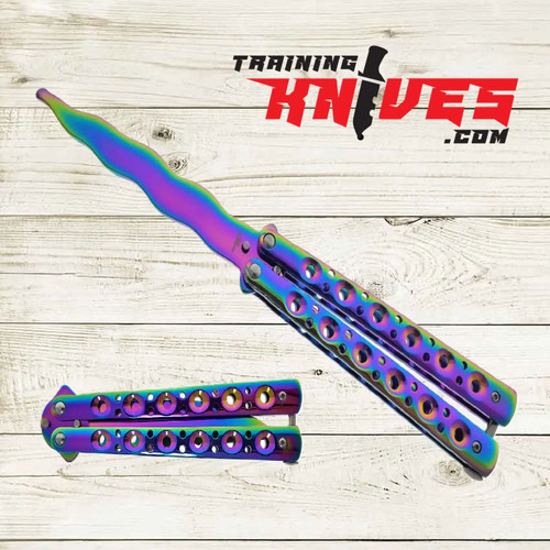 Hero – Rainbow 440 Steel Kriss Spear Point Balisong Butterfly Trainer shown open with unsharpened blade and closed side by side, rainbow stainless steel skeletonized handles visible Hero – Rainbow 440 Steel Kriss Spear Point Balisong Butterfly Trainer shown open with unsharpened blade and closed side by side, rainbow stainless steel skeletonized handles visible
