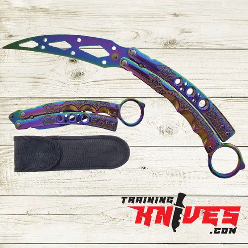 Hero – Rainbow 440 Steel Balisong Karasong Karambit Trainer shown open with unsharpened curved karambit-style blade and closed side by side, rainbow stainless steel handles visible Hero – Rainbow 440 Steel Balisong Karasong Karambit Trainer shown open with unsharpened curved karambit-style blade and closed side by side, rainbow stainless steel handles visible
