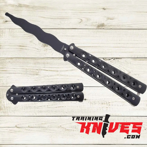Hero – Black 440 Steel Kriss Balisong Butterfly Trainer shown open with unsharpened kriss-style blade and closed side by side, black stainless steel skeletonized handles visible Hero – Black 440 Steel Kriss Balisong Butterfly Trainer shown open with unsharpened kriss-style blade and closed side by side, black stainless steel skeletonized handles visible