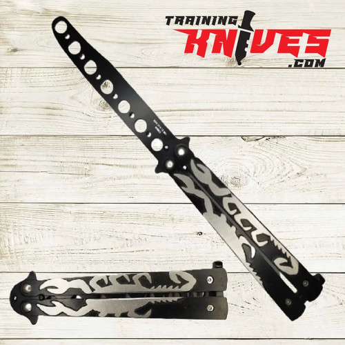 Hero – Black Scorpion 440 Steel Balisong Butterfly Trainer shown open with unsharpened blade and closed side by side, engraved black stainless steel scorpion handles visible Hero – Black Scorpion 440 Steel Balisong Butterfly Trainer shown open with unsharpened blade and closed side by side, engraved black stainless steel scorpion handles visible