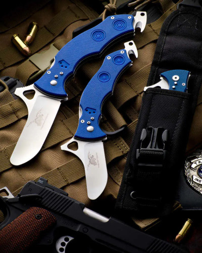 CSSD SC CRMIPT Satin 8Cr13MoV Blue G10 Military Training Knife with two open knives and a third folded knife resting in a sheath