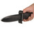 Hand holding stun gun knife pointed toward the camera