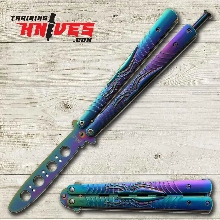 MTechUSA Rainbow Spider Tinite Spring Loaded Butterfly Trainer shown open with rainbow tinite blade and spider web handles visible with closed trainer beside it