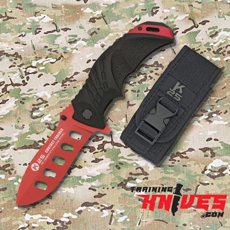 Red folding military trainer with nylon sheath shown beside trainer