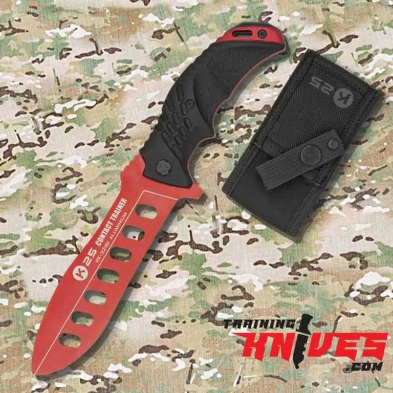 Red aluminum military fixed blade trainer with nylon sheath shown beside trainer