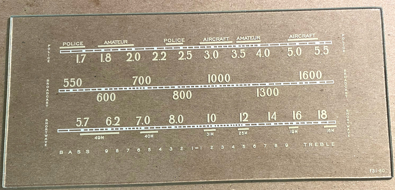 Dial image taken against tan/brown background to illustrate light color dial print - dial is clear glass other than dial scale printing