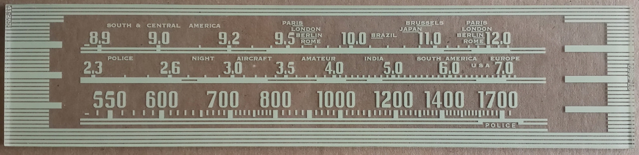 Dial image take against a tan background to illustrate dial print - dial is otherwise clear.