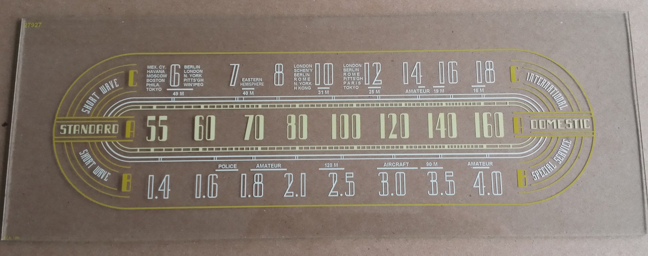 Dial image taken against a tan background to illustrate white print - dial glass is clear other than dial scale printing