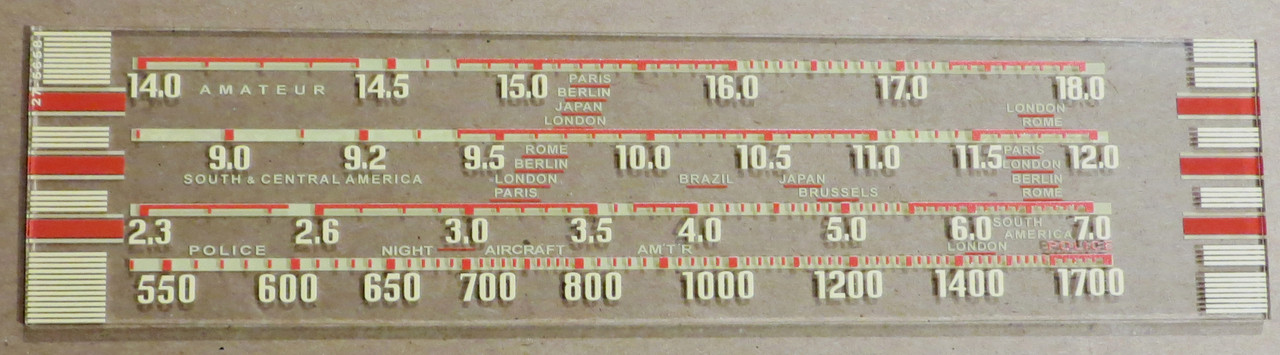 Dial image taken against a tan/brown background to better illustrate dial print. Dial scale is clear other than scale print.