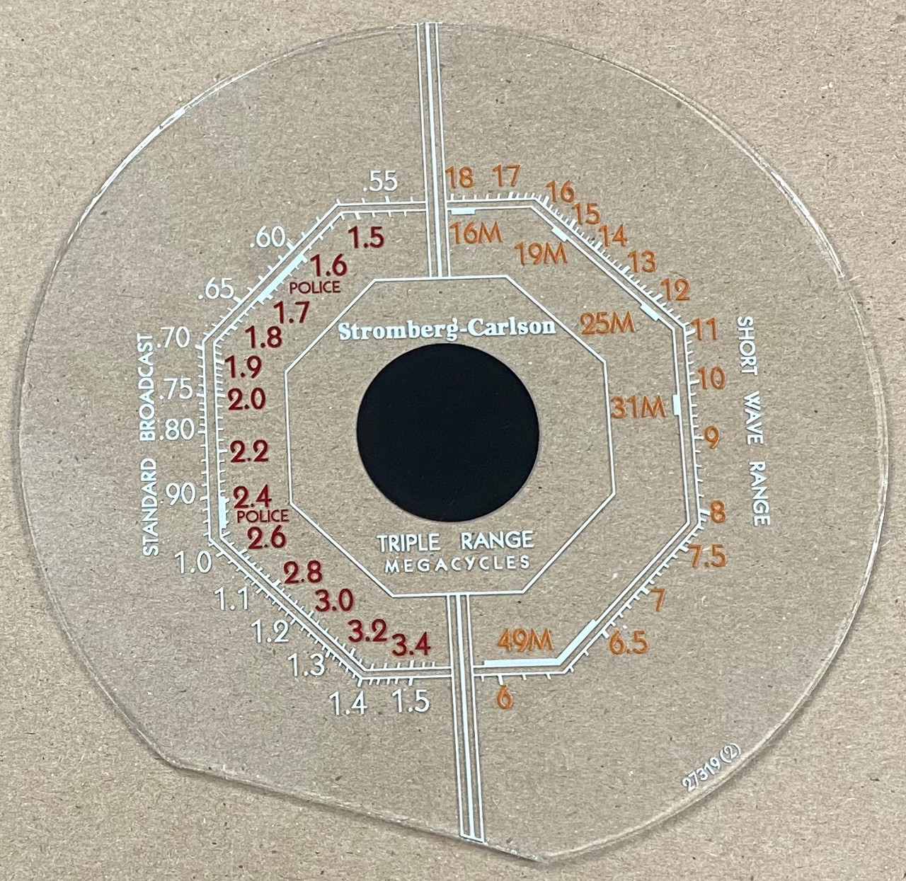 Dial image taken against a tan/brown background to better illustrate white portions of dial scale. Dial is clear glass other than dial scale printing.
