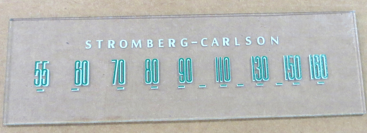 Dial image taken against a tan/brown background to illustrate white dial scale print. Dial is clear glass other than dial scale print.