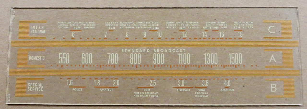 Dial image taken against a tan/brown background to better illustrate the off white dial print. Dial scale is clear glass other than print.