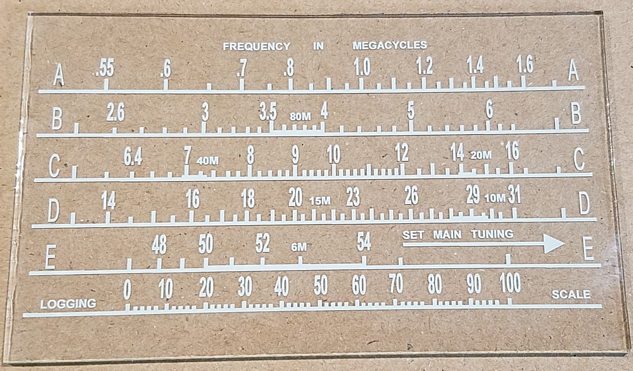 Dial image taken against a tan background to illustrate white scale print. Dial is clear other than white scale.