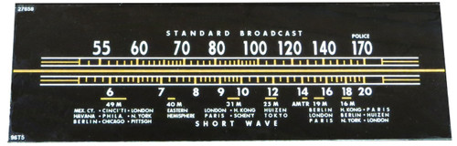 Dial image taken against a black background to illustrate white dial print. Dial is clear glass other than white and gold print.