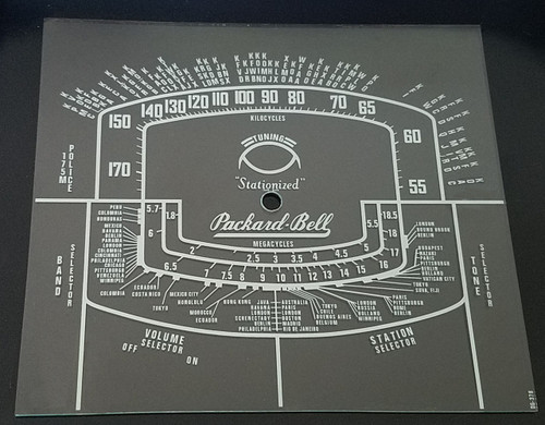 Dial photo taken again black background to illustrate white print. Dial is clear other than white print.