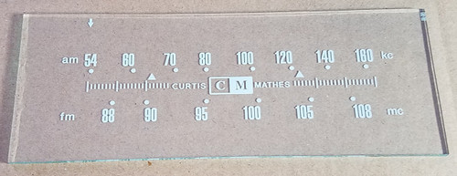 Dial image taken against a tan background to illustrate white print. Dial is clear other than print.