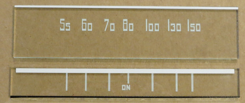 Dial images taken against a tan/brown background to illustrate white dial print. Dials are clear glass other than printing.