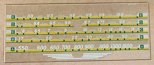 Dial image taken against tan background to illustrate white print. Glass is clear other than printing.
