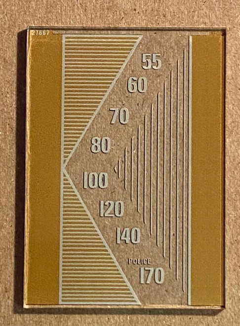 Dial image taken against a tan/brown background to better illustrate white dial print. Dial is clear glass other than scale print.