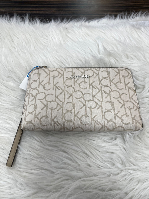 Vist Large View of Product Image Which is Used Calvin Klein Leather Wristlet